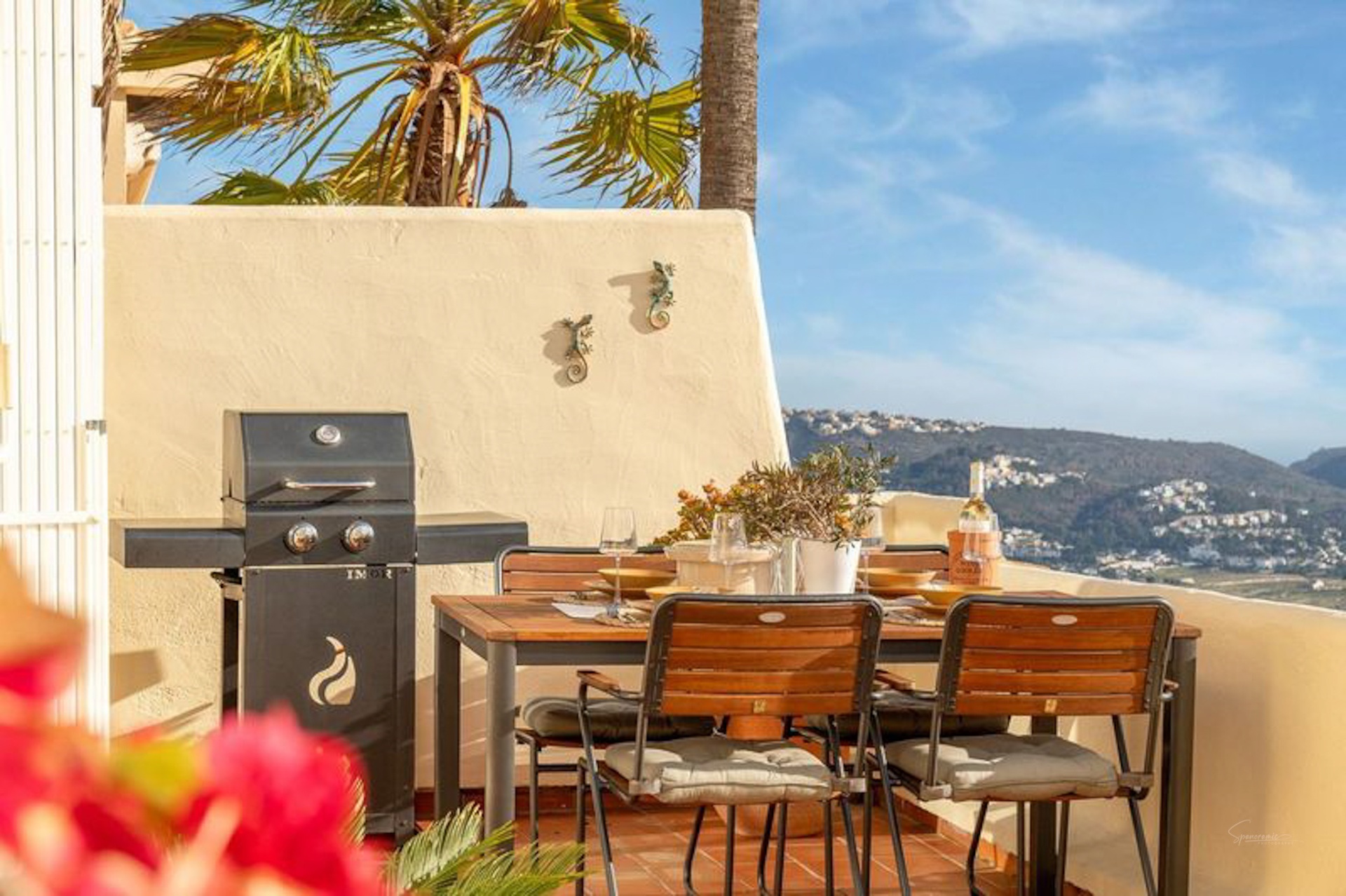 Sunlit Mediterranean terrace with sea view styled by Casa Norte